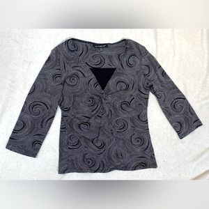 Grey & black abstract print knit top. 3/4 length sleeves. Size L.